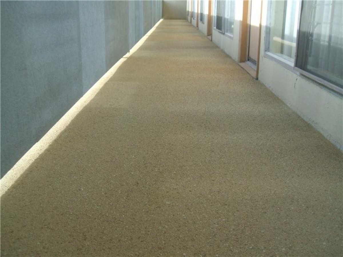 Same walkway after Concrete Textures resurfacing, smooth tan finish